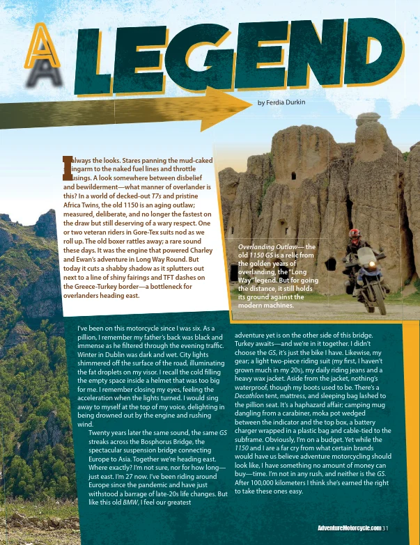 A magazine page showing a BMW GS beneath rock formations